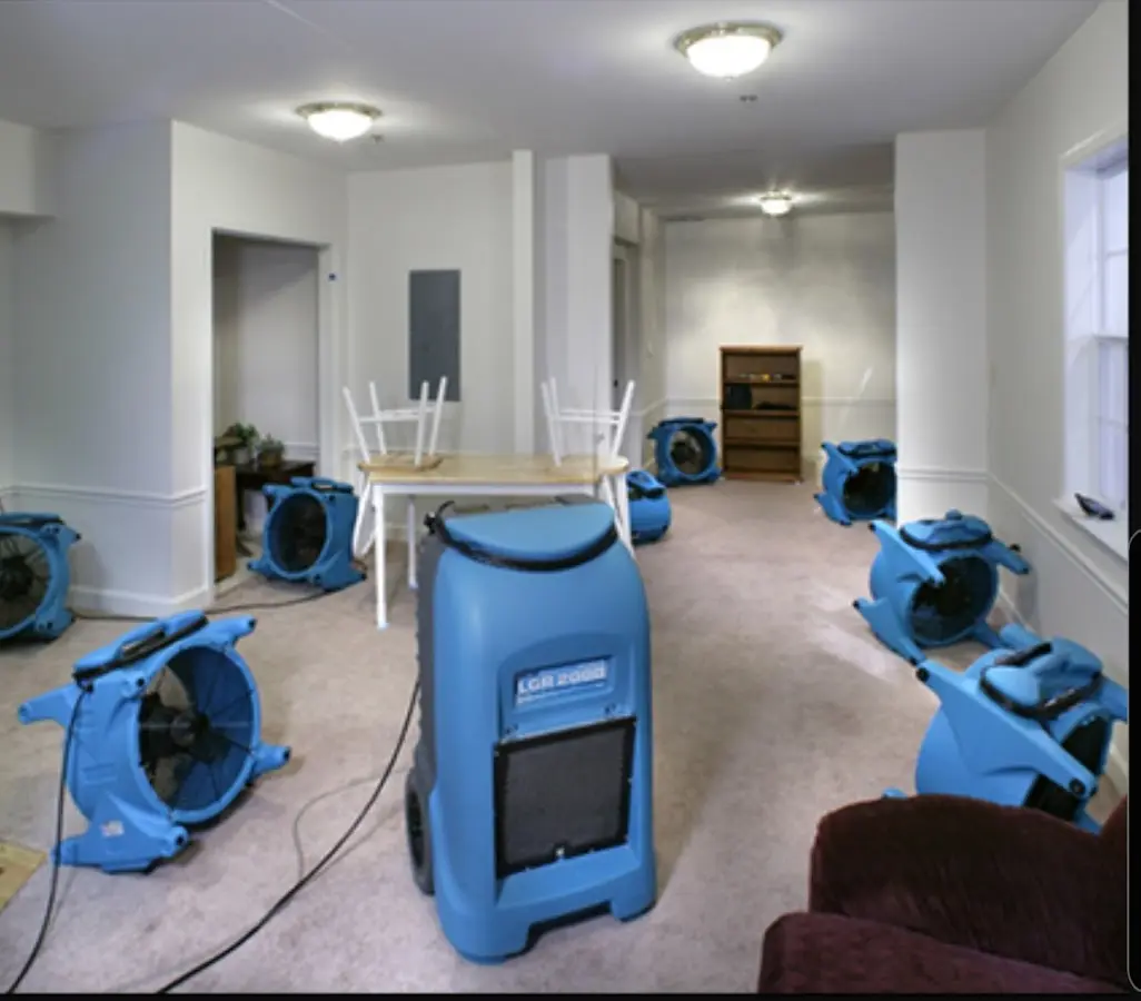 Air movers and dehumidifier setup for Water Damage Restoration in New Haven